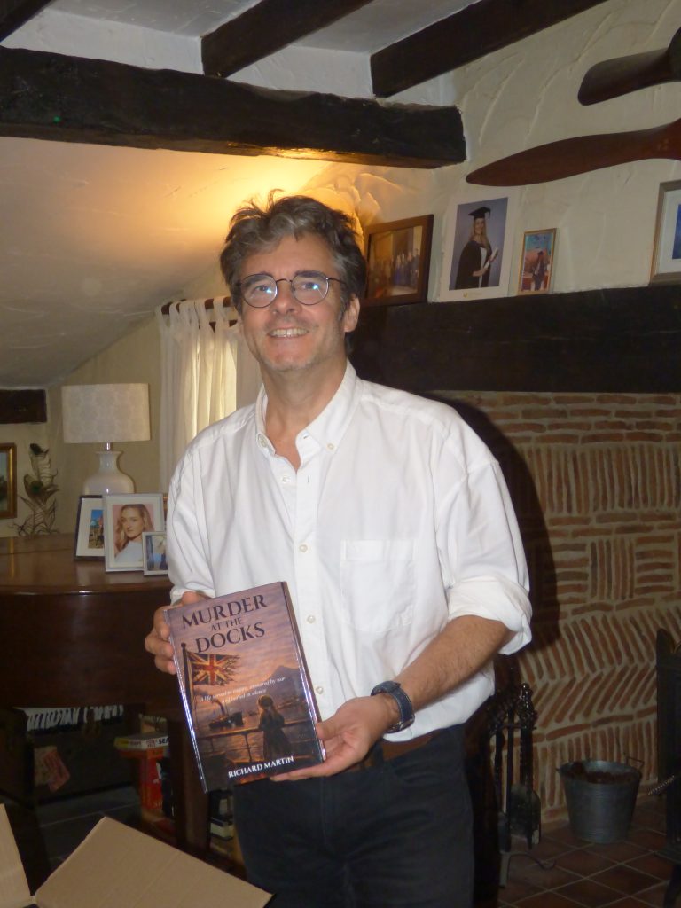 Richard Martin, Author, with the first copy of Murder at the Docks
